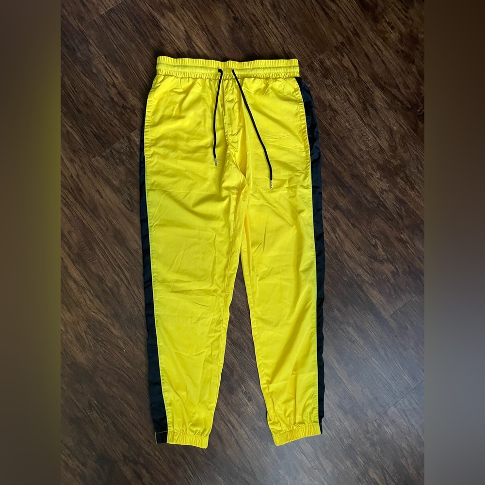 Yellow track pants